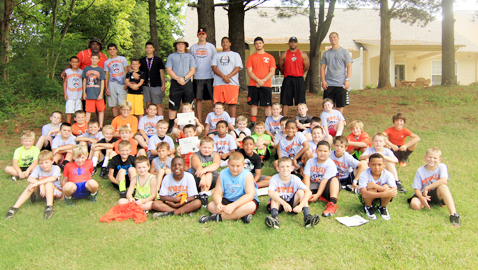  Campers and volunteer instructors pose for the camp photo at Levi Park Saturday, July 12.  Photo by Tracy Heard.