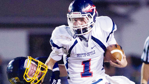Brody Rollins, South-Doyle quarterback and the school’s Male Athlete of the Year for 2013-14, battles for yardage in a win over Seymour last season.