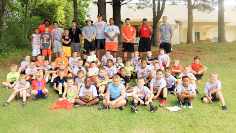 Campers and volunteer instructors pose for the camp photo at Levi Park Saturday, July 12. Photo by Tracy Heard.