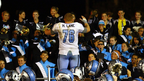 PHOTO BY JAMES SPEARS Gibbs High senior standout Hunter Lane directs the band as the Eagles celebrate a 39-6 win over Powell Friday night.