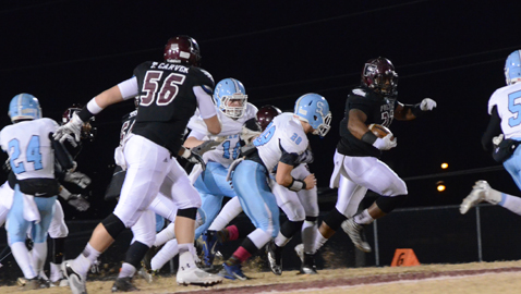 PHOTO BY COURTNEY RADER Fulton’s D.J. Campbell is on the loose in the Falcons’ 49-14 win over Sullivan South in Class 4A quarterfinal action Friday night at Bob Black Field. Tackle Tripp Carver (56) gets down field to help block for Campbell.