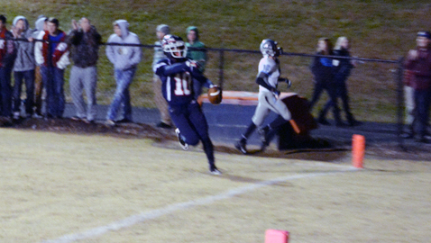 Photo by Dan Andrews. South-Doyle quarterback Cameron Jones celebrates a touchdown in the Cherokees' playoff win over the Eagles. South-Doyle improved to 11-0 with the 32-21 win over the Eagles.