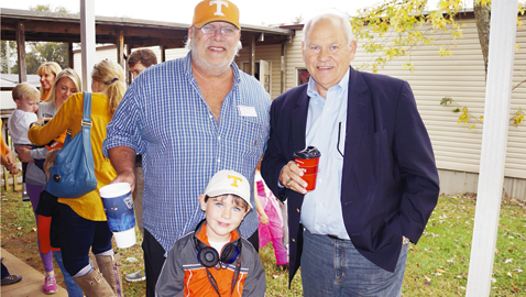 Dave Moore (left) and Phillip Fulmer, along with Moore’s grandson, J.B. Moore, share time together this past fall. It was “dress up who you would like to be like” day at Rocky Hill Elementary school, where 5-year-old J.B. is in kindergarten. Notice the head phones J.B. is wearing. He was dressed like his grandfather, a former coach.