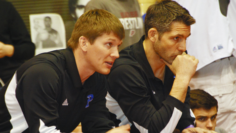Photo by Dan Andrews. Page High School wresting coach has made the school program into a power house. The former Halls wrestler and assistant coach brought his Patriots to the Halls Invitational recently.