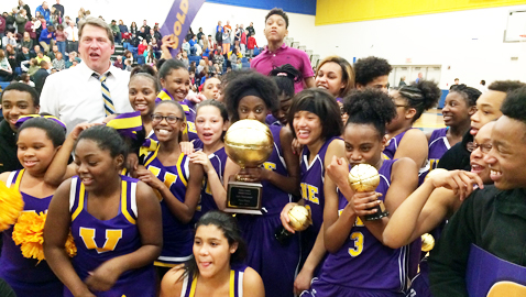 PHOTO BY CLARENCE SWEARENGEN Players, cheerleaders and coaches celebrate the Vine Lady Golden Bears’ Knox County Middle School basketball tournament championship Feb. 5 at Karns Middle School. Vine defeated West Valley 38-36 for the gold basketball.