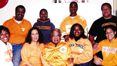 Sam McKenzie Jr. (front row, center) is surrounded by family members in a photo he says was taken “four or five years ago.” There’s no question which college team this family is behind. Back row, from left, son Samuel P. McKenzie, grandsons Jalen and Kahlil McKenzie, and son Reggie McKenzie. Front row, from left, granddaughter Jasmin McKenzie, daughter-in-law Gwen McKenzie, daughter-in-law June McKenzie and granddaughter Mahkayla McKenzie. Reggie and June are parents of the four grandchildren.