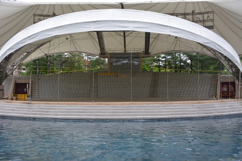 An amphitheater with no chairs and a lake that is broken. Just part of the problems at World's Fair Park.