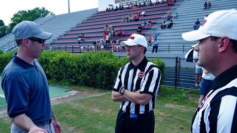 Lee Hedrick (left) instructs officials at the East Tennessee clinic in May at Central High School. Hedrick will be a new full-time official in the Southeastern Conference this fall. Hedrick will be a Center Judge, a new position in SEC crews this season.