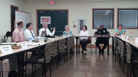 Photo by Mike Steely. Jim Hagerman speaks to the Neighborhood Advisory Council about how to go about closing a street for a special event.