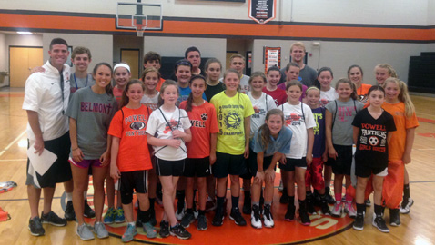 Players and coaches gather during last week's FCA Panther  Pride Girls Basketball Camp. Pictured with the players and coaches is former Gibbs  High School  standout and recent Belmont University graduate Taylor Mills. Mills spoke  about basketball and faith at the Powell Middle School Camp.
