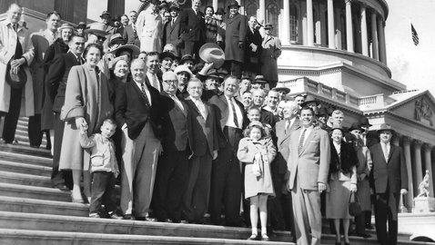 Photo from the author’s personal collection. Congressman Robert A. “Fats” Everett celebrates his election to Congress on the steps of the Capitol with friends and family.  Everett is in the center, waving his hat.