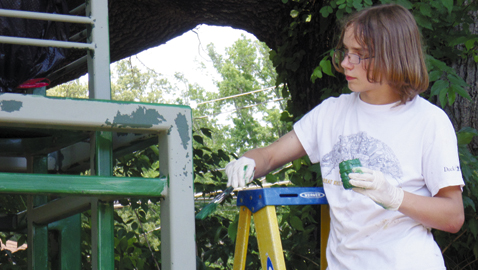 Nicholas West worked on earning his Eagle Rank with Boy Scout Troop 506 in Halls - Knoxville by refurbishing the main gate at Fountain City Park as well as sanding and painting two bridges that enter the park from the Broadway.