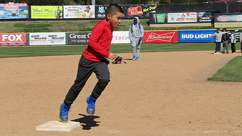 Kids from Boys & Girls Clubs have a ball at Smokies Stadium